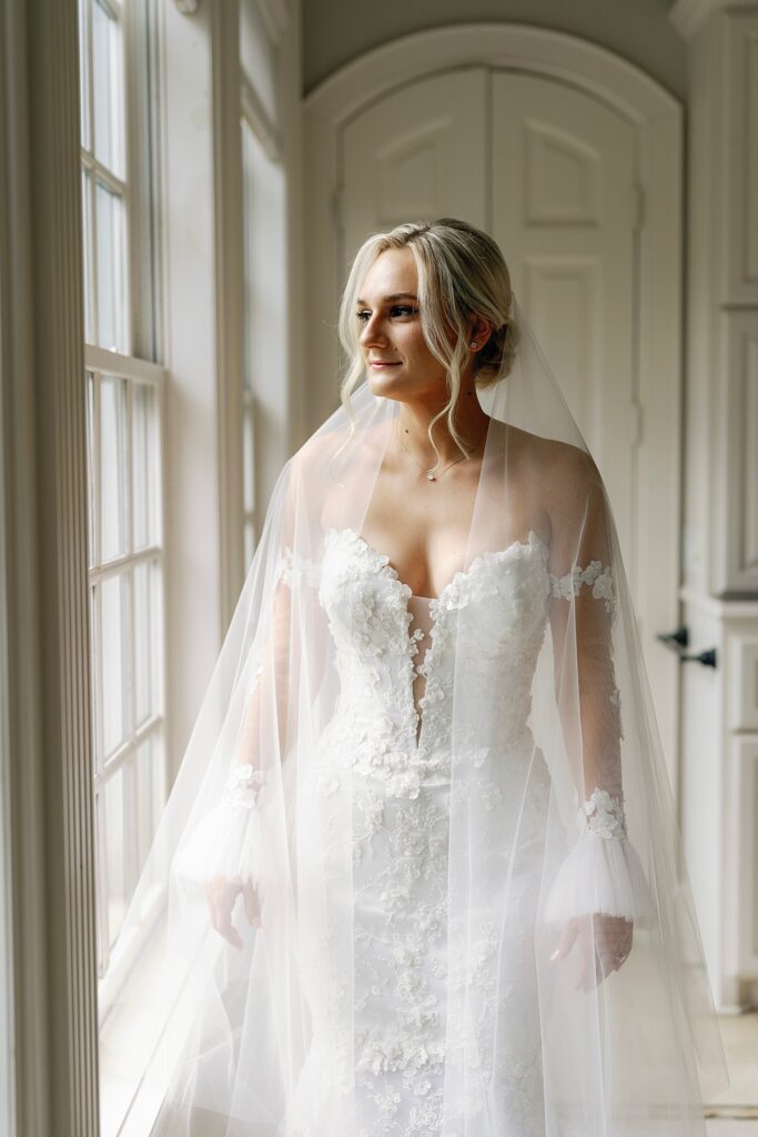 Bride getting ready in bridal suite at Sandlewood Manor Tomball TX